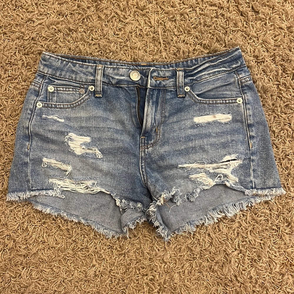 mid rise, medium wash, little holes